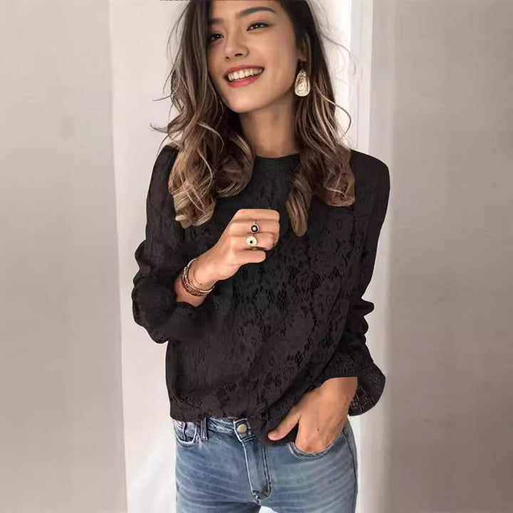 Dame spids top med elegant blomsterdesign og lange ærmer Stilla