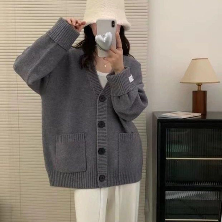 Kvinders Casual Oversized Cardigan med Store Lommer og Knap Detaljer Stilla