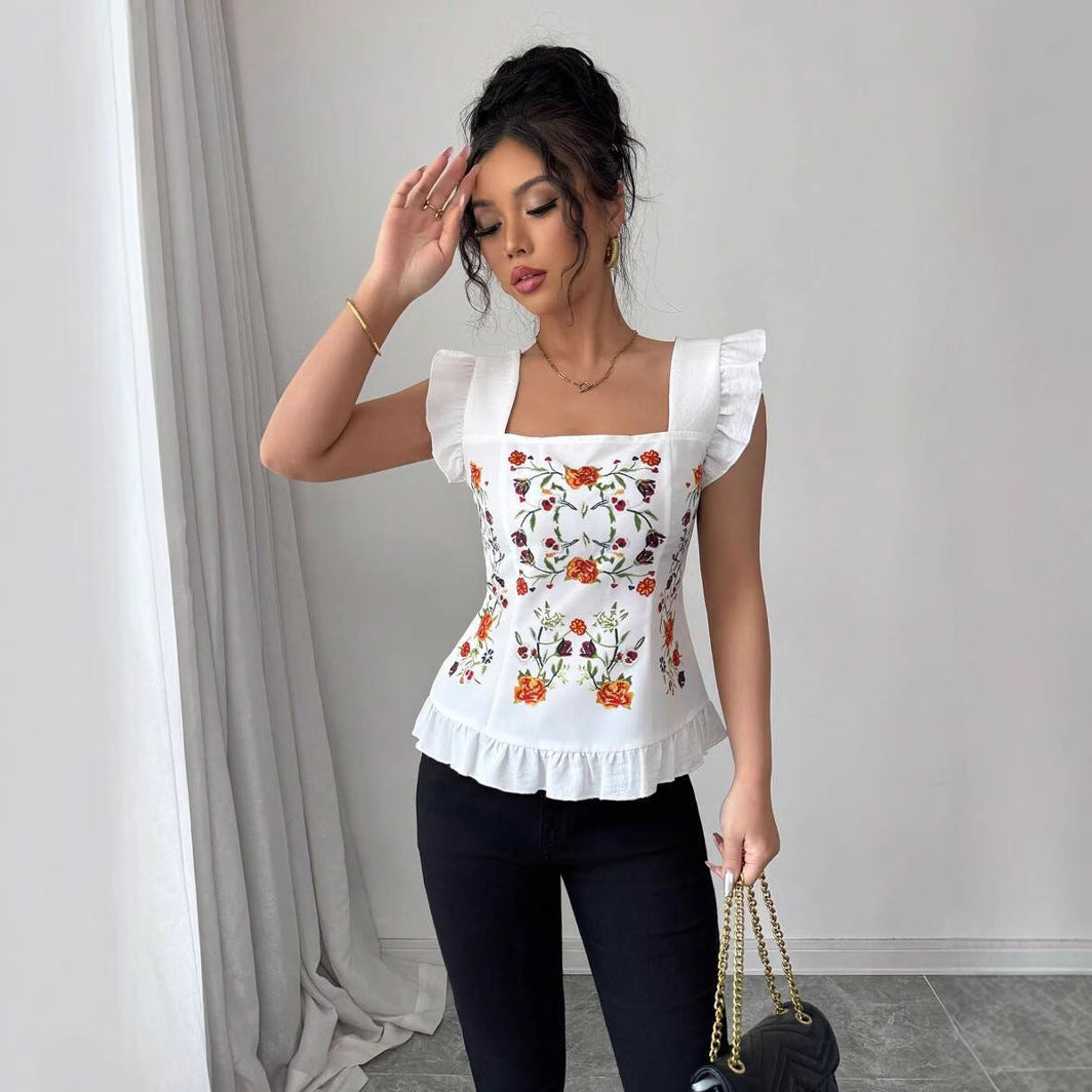 Damebluse med blomster broderier og flæse detaljer Stilla