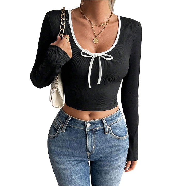 Kvinders langærmet crop top med dekorativ knude og elegant ribstruktur Stilla
