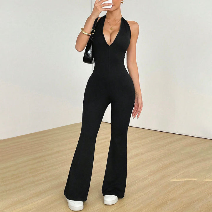 Kvinders jumpsuit med dyb V-hals og bredskåret ben Stilla