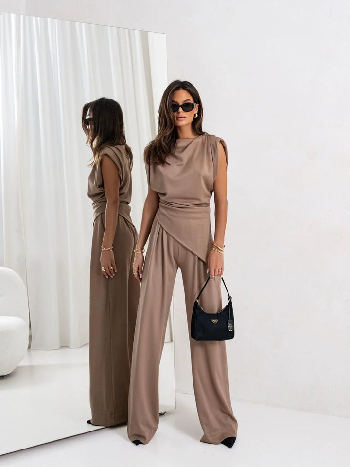 Dame elegant jumpsuit med asymmetrisk snit og bred ben Stilla