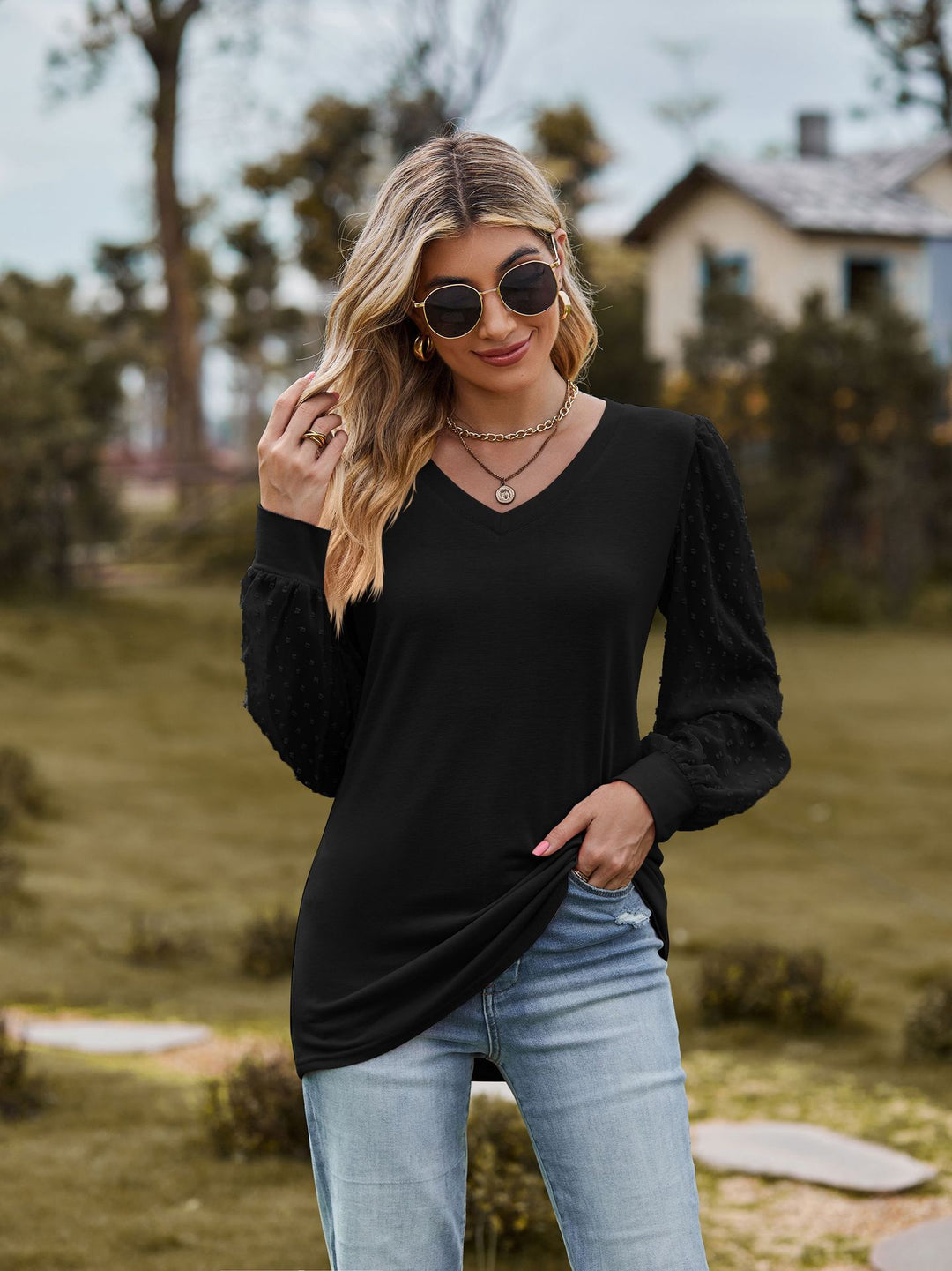 Damebluse med puffærmer og struktureret design Stilla