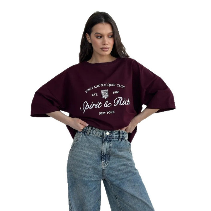 Dame Oversized T-shirt med afslappet polo-design og inspirerende statement Stilla