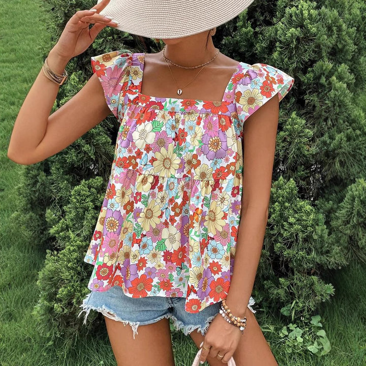 Dame bluse top med floralt print og flæsedetaljer Stilla