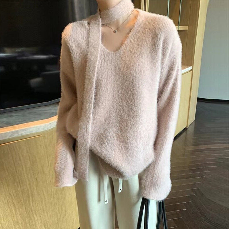 Dame grovstriktr sweater med dyb V-hals og flotte bånd detaljer Stilla