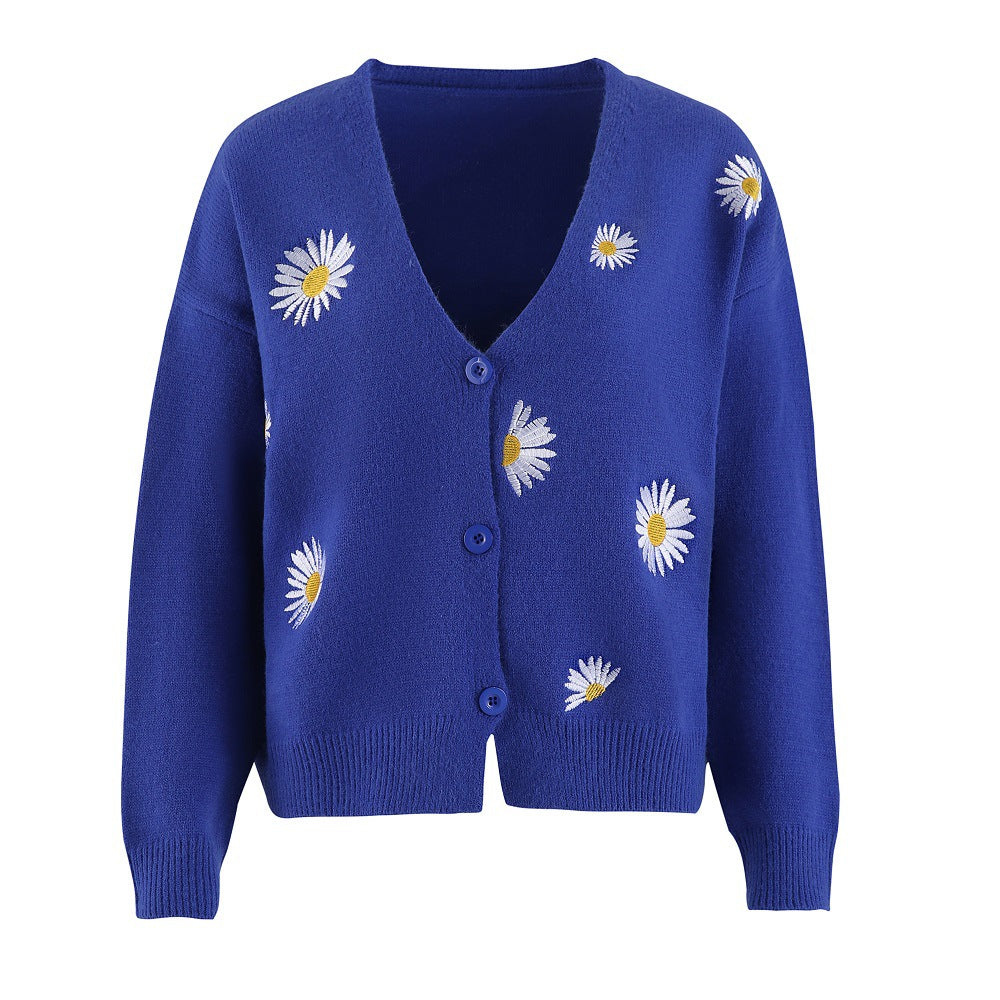 Dame strikjakke med blomsterdesign og knaplukning Stilla