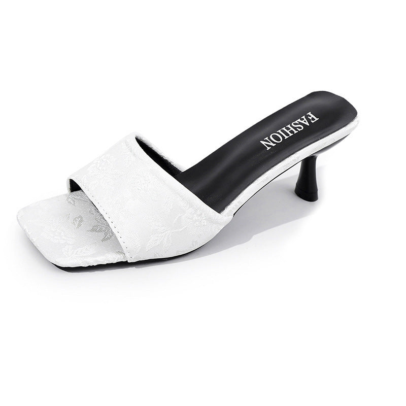 Damer Behagelige Slingback-Pantoletten med elegant blomstermønster og moderne hæl Stilla