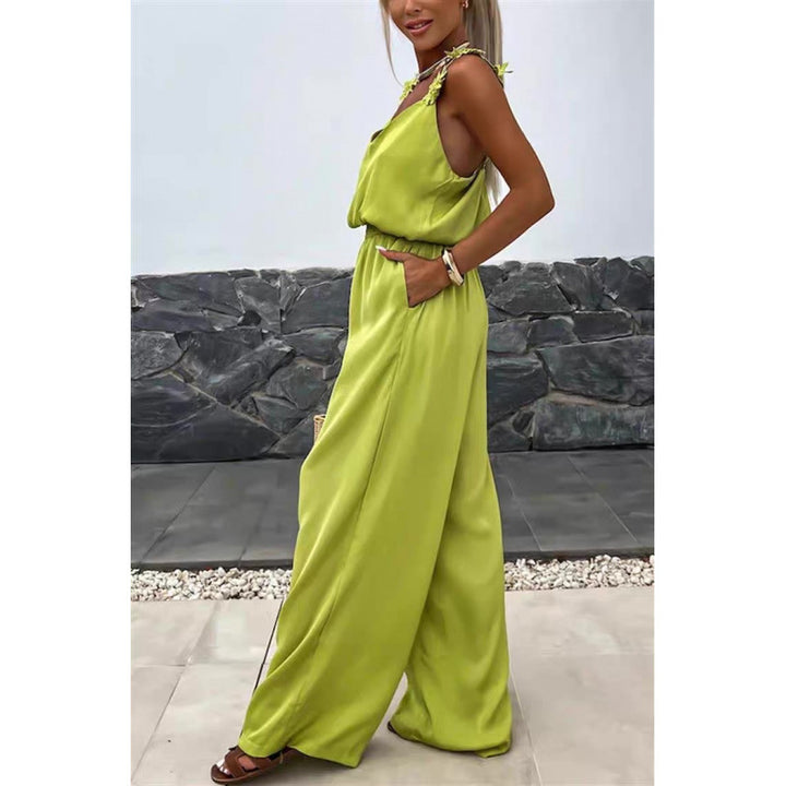 Dame jumpsuit med blomstrede flæser og brede ben Skovae