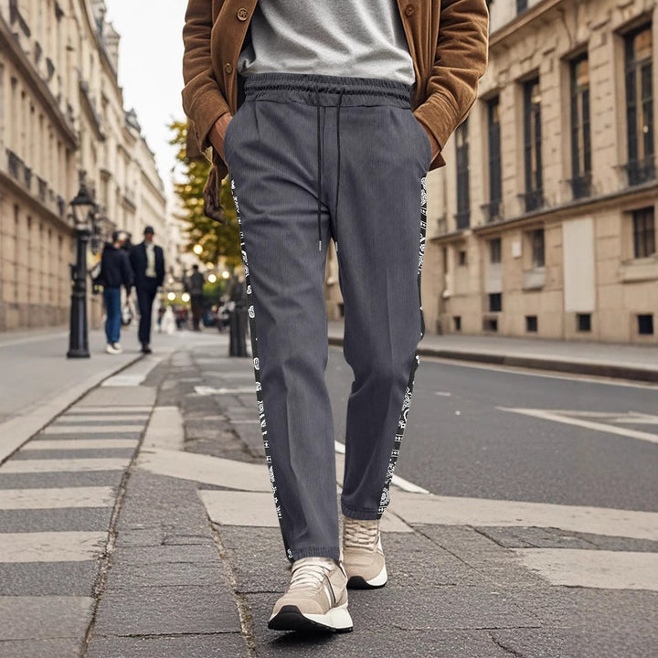 Herrer stilfulde joggingbukser med sideløst grafikdesign og elastisk talje Stilla
