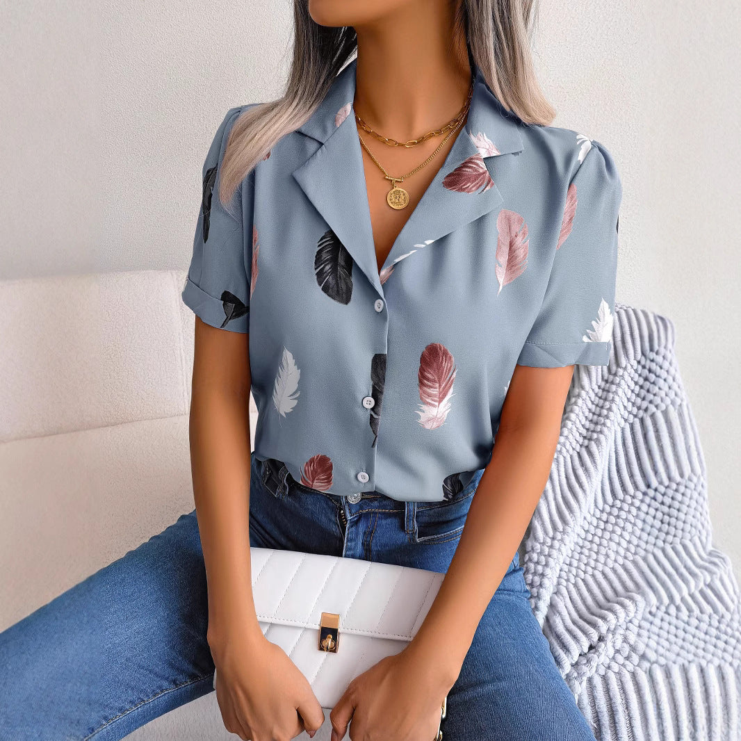 Damebluse med elegant fjerdesign Stilla