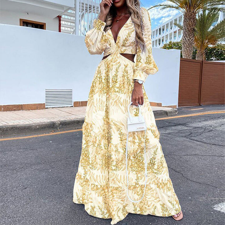 Dame Maxi-kjole med florale cut-out-detaljer og voluminøse ærmer Stiila
