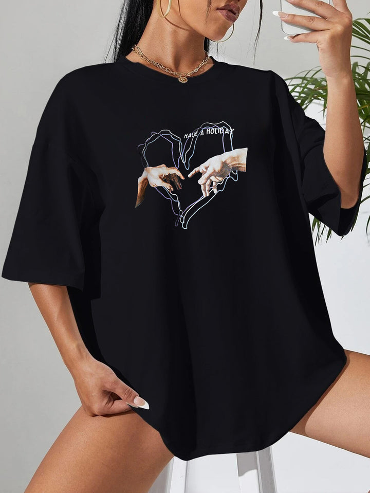 Dame afslappet T-shirt med kreativ håndmotiv og oversized snit Stilla