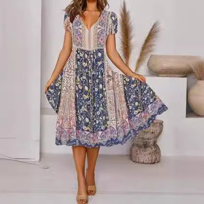 Dame Boho inspireret Midikjole med blomsterprint og V-udskæring Stilla