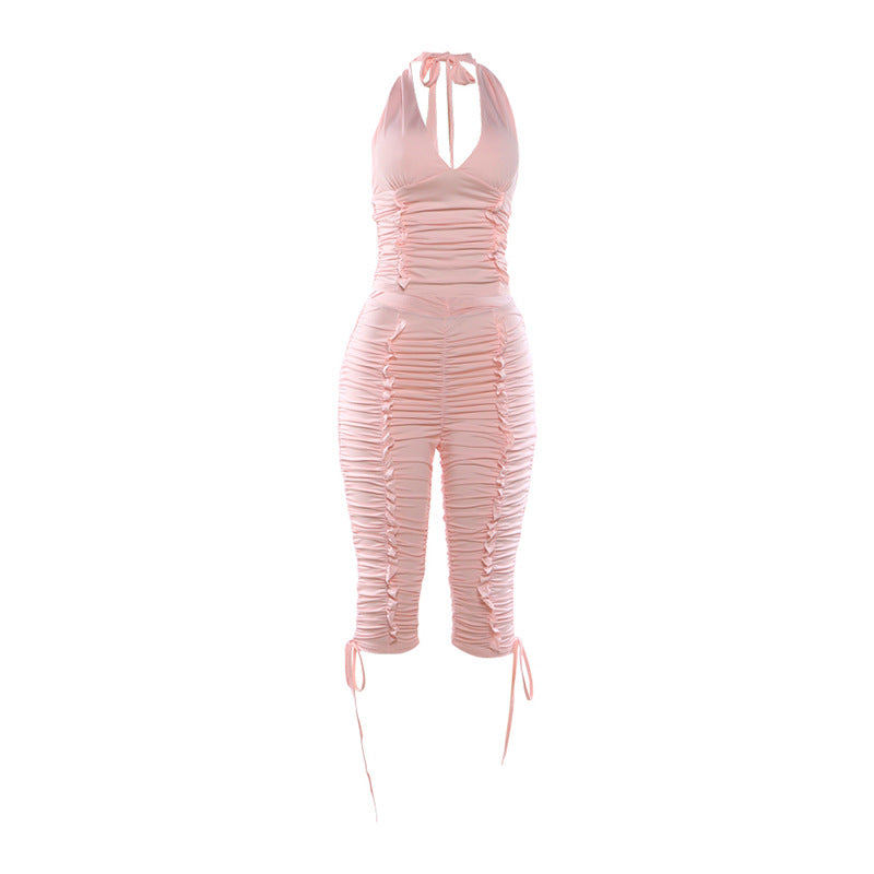 Dame jumpsuit med raffinerede rynkeelementer og stilfulde bånd Skovae