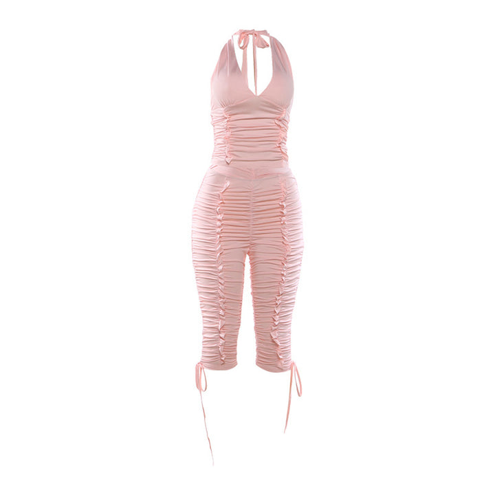 Dame jumpsuit med raffinerede rynkeelementer og stilfulde bånd Skovae