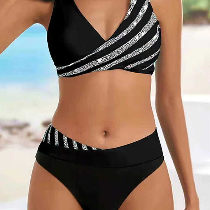 Dame bikinisæt med asymmetrisk snit og trendy striber Stilla