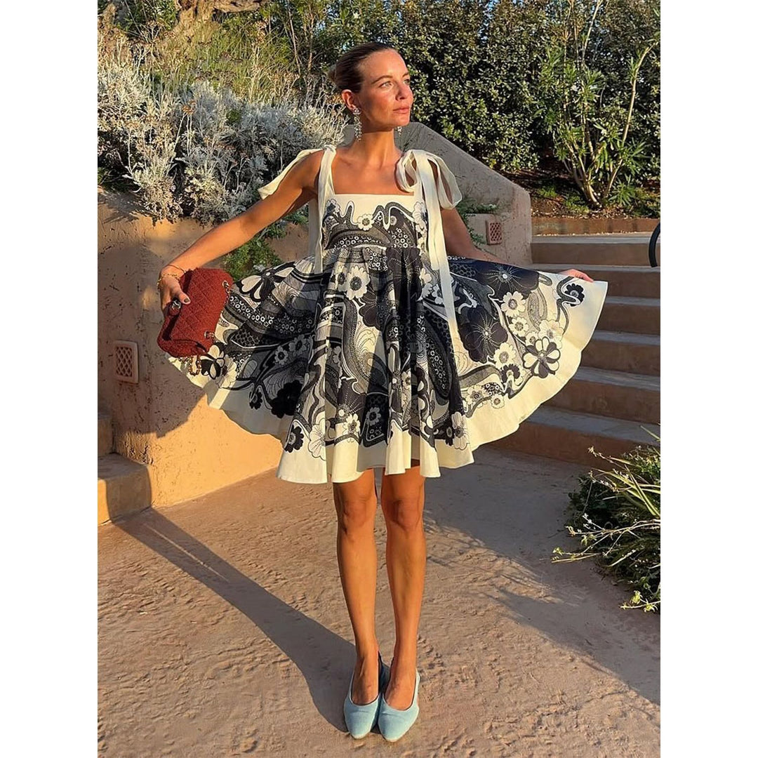 Women's summery mini dress with playful pattern mix and flowy cut Skovae