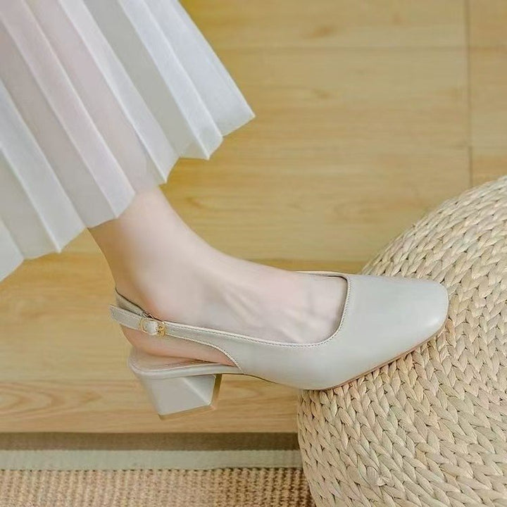 Dame Slingback-pumps med dekorativ rem og elegant blokhæl Stilla