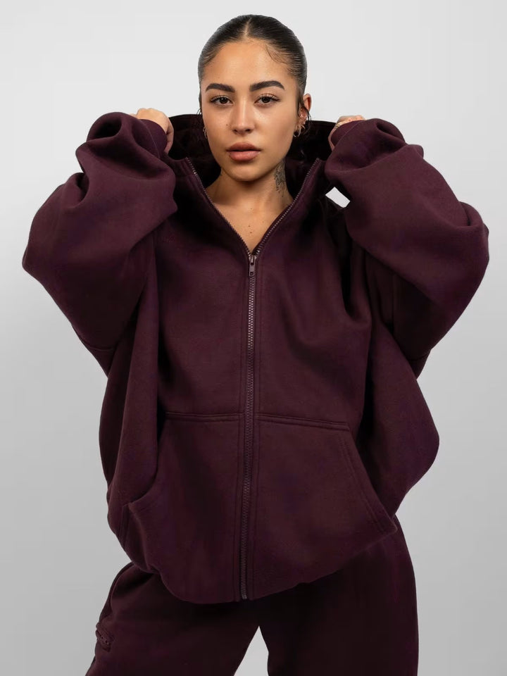 Kvinders sporty fleece-sæt med høj krave og praktiske lommer Skovae
