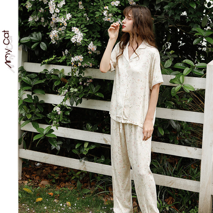 Dame elegant pyjamasæt i let, åndbart materiale med blomsterprint Stilla