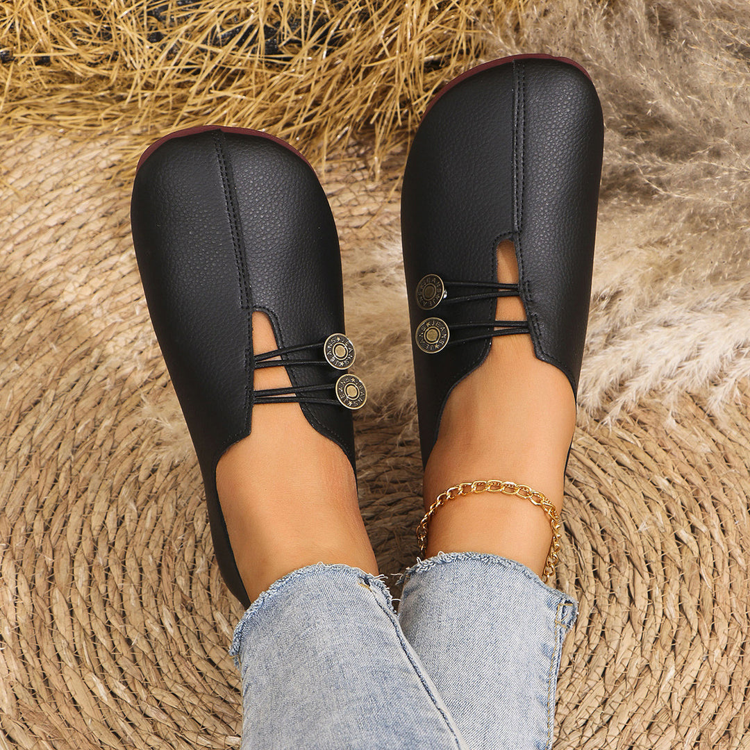 Dame Slip-On sko med moderigtigt knapdetalje og blødt overmateriale Stilla