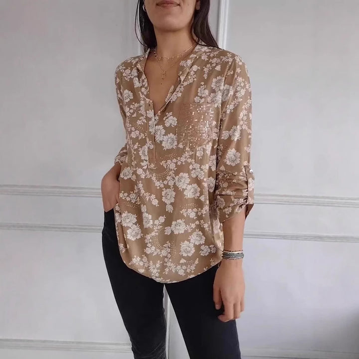 Damebluse med blomsterdesign og glitrende pailletter Stilla