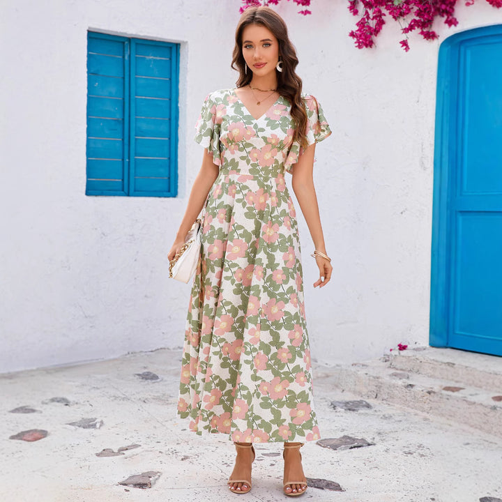 Dame maxikjole med blomstrede ruffles og tætsiddende snit Stilla