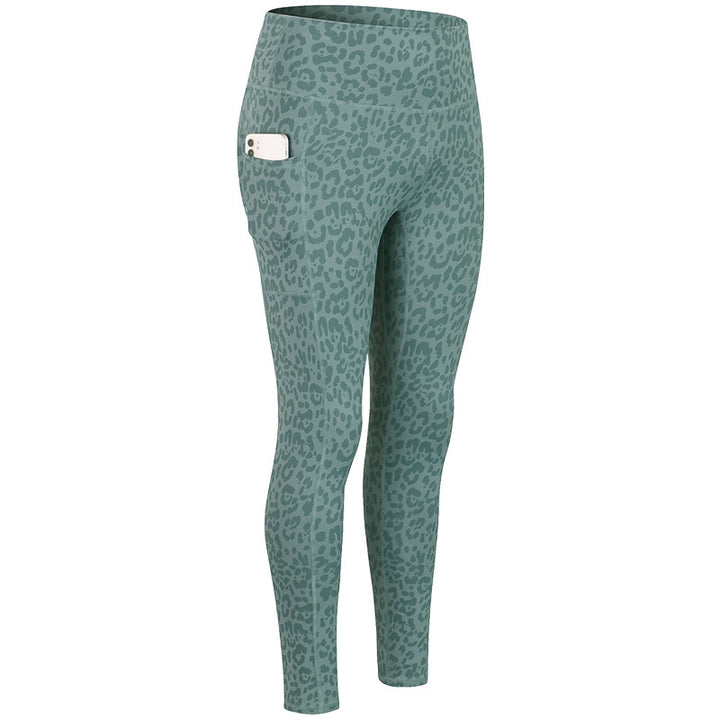 Dame Kvalitets Performance-Leggings med praktiske sidelommer og elastisk talje Stilla