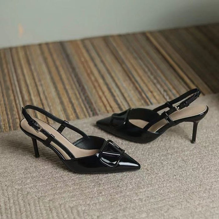 Dame Sling-Pumps med elegant spids form og justerbar rem Stilla