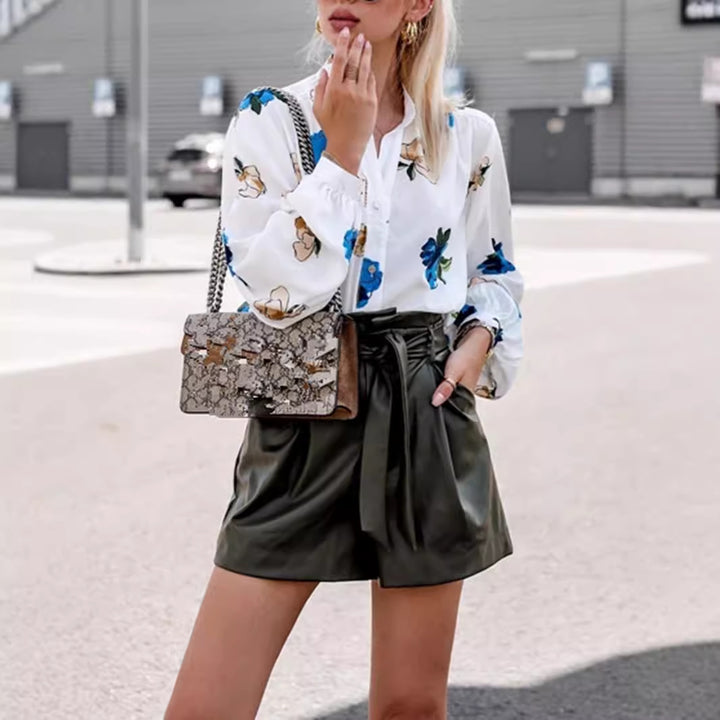 Damebluse med blomsterdesign og brede ærmer Stilla