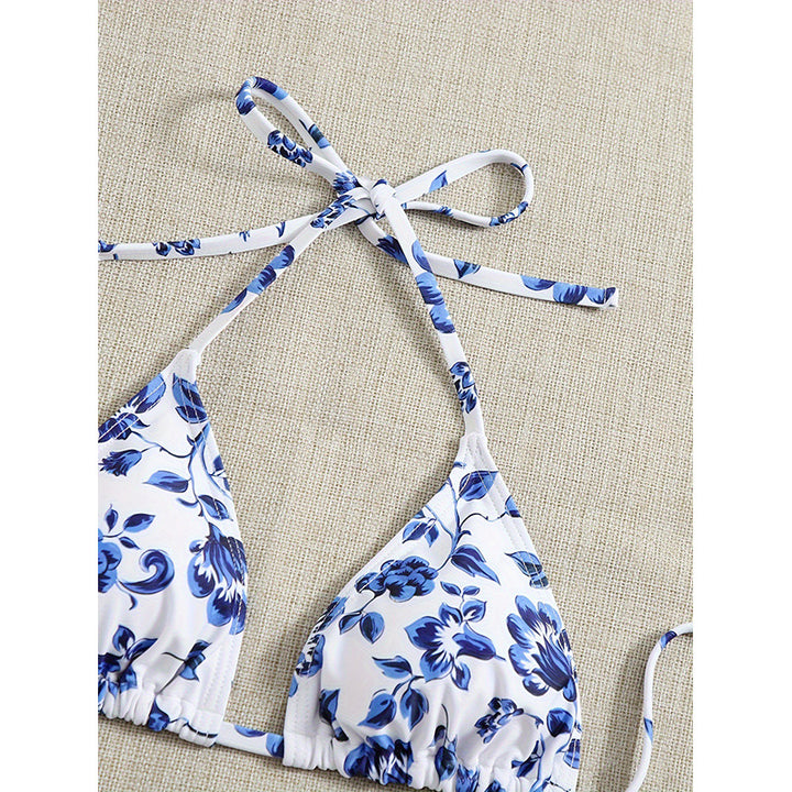 Dame trekant-bikini med blomstrete design og smart sarong Skovae