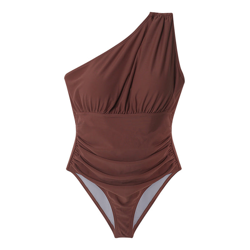 Dame en-delt badedragt med asymmetrisk snit og figurformende design Stilla