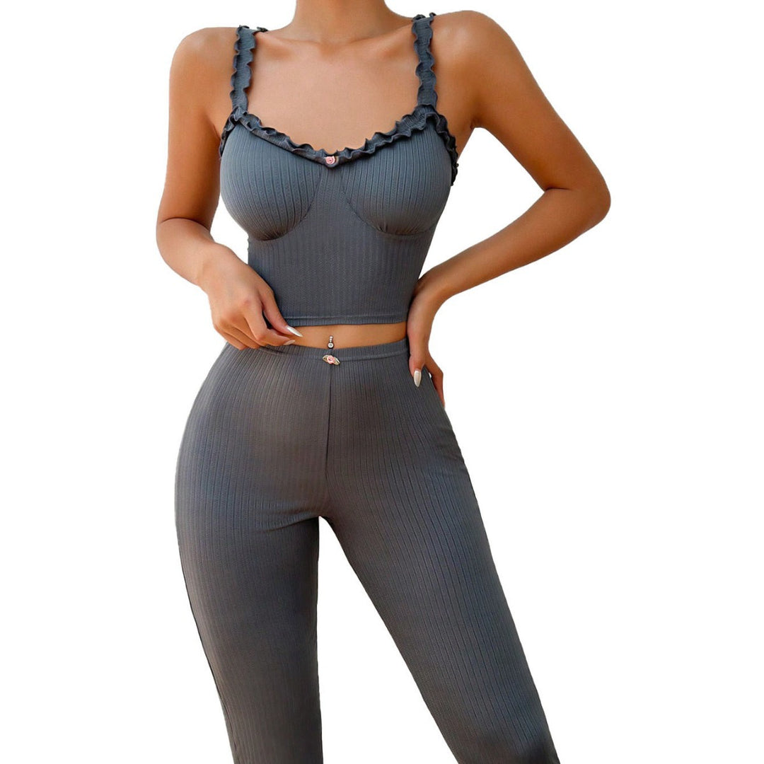 Dame sæt bestående af figur-huggende crop top og elegante lange bukser Stilla