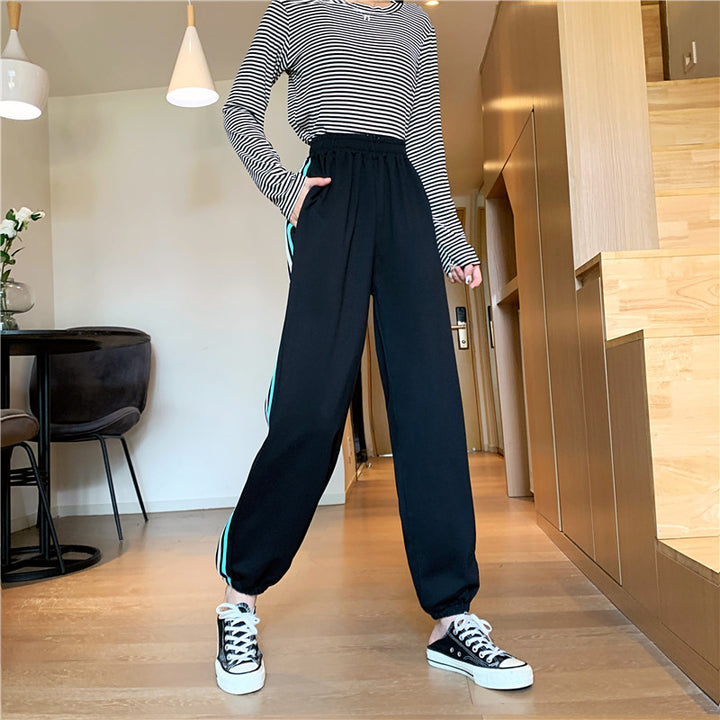 Dame sporty joggingbukser med stilfulde sideindsatser Stilla
