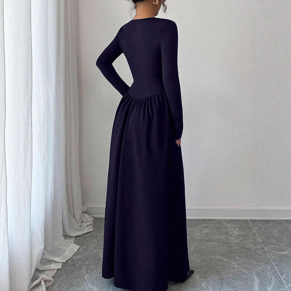 Dame maxikjole med elegante knapdetaljer og flydende skørt Skovae