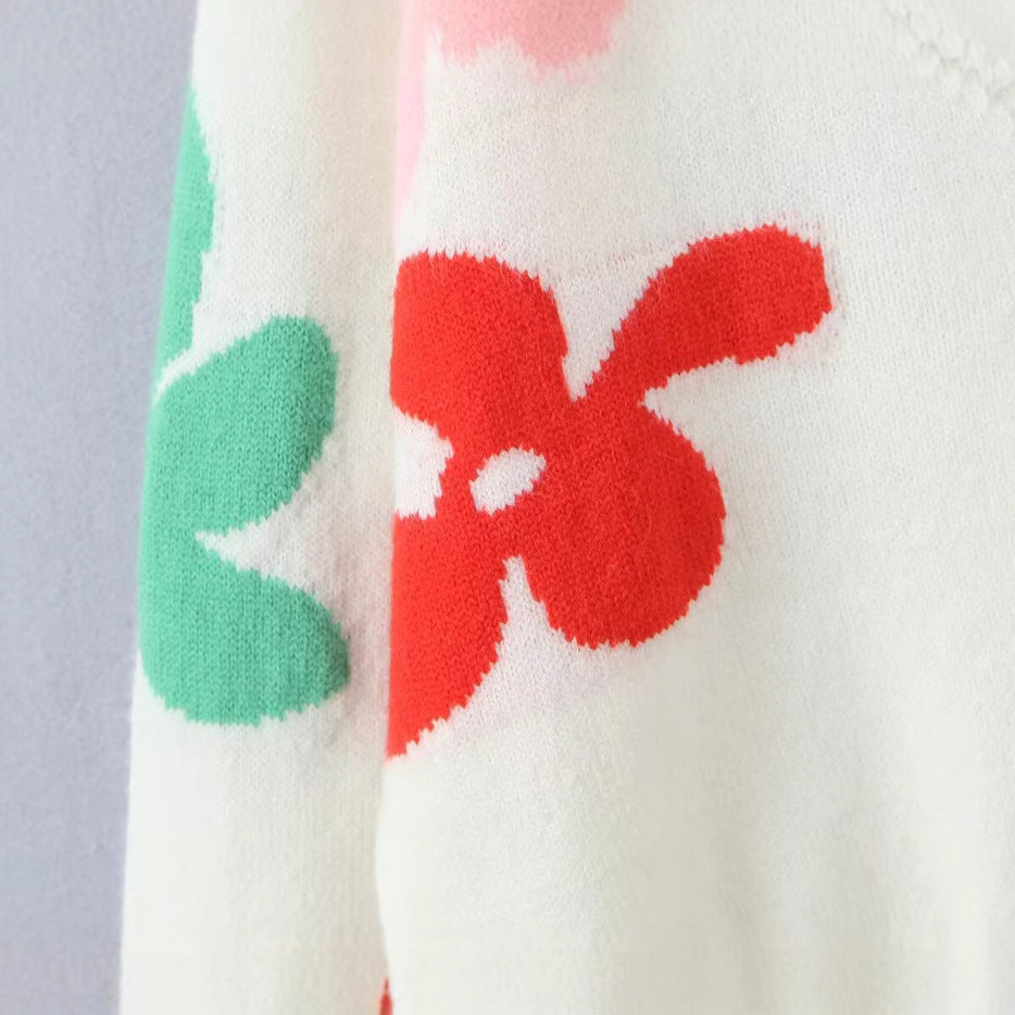 Kvinders hyggelige strikkede cardigan med farverigt blomstermønster Stilla