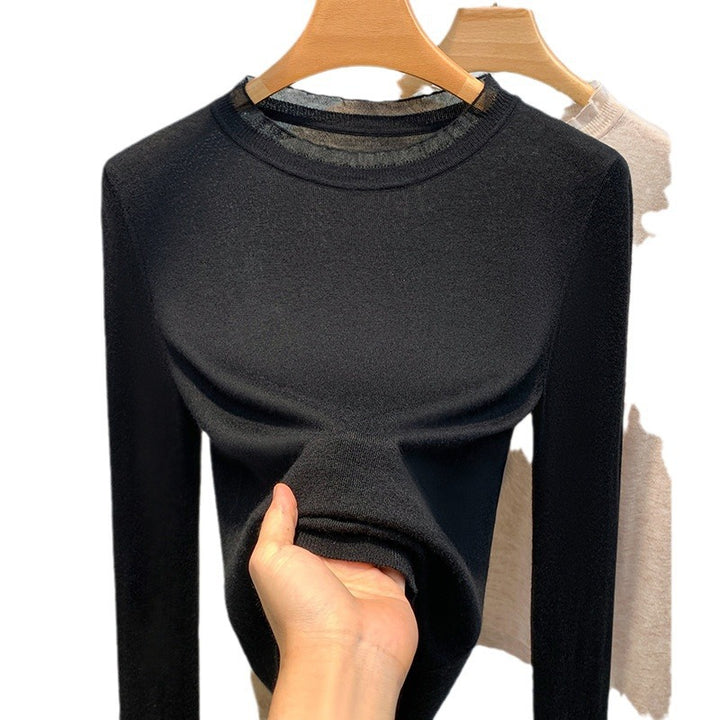 Dame finstrik bluse med elegant rund halsudskæring og blød tekstur Stilla