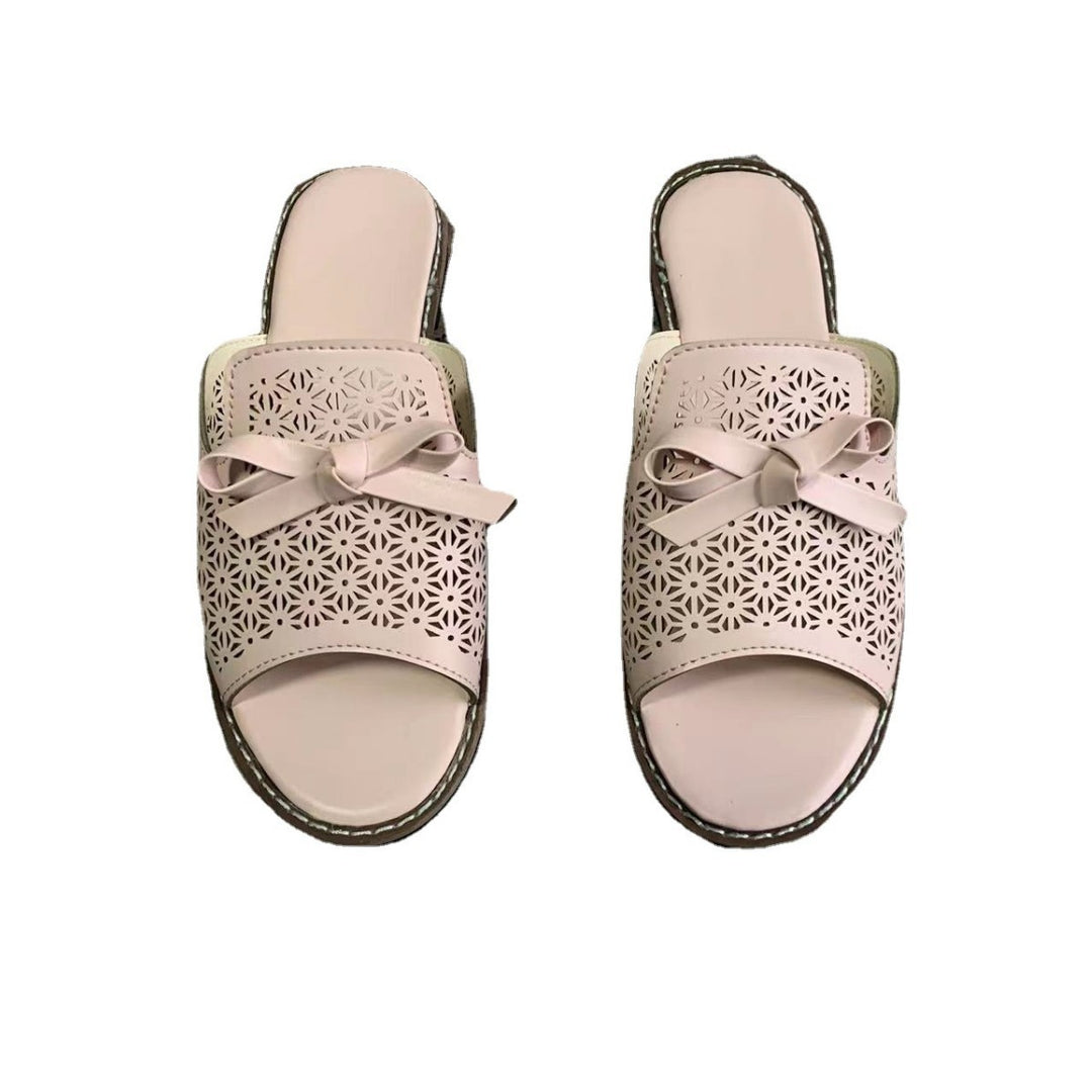 Dame trendy tæerimuler-sandaler med blomstermotiv og dekorativt sløjfedetalje Stilla
