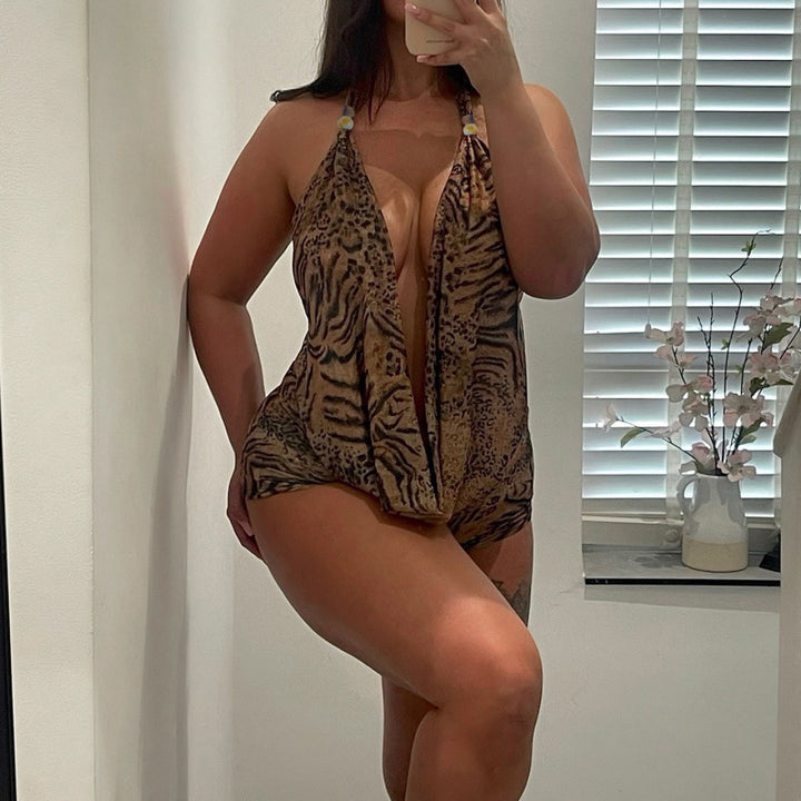 Dame elegant jumpsuit med dyb V-udskæring og legesyg dyreprint Skovae