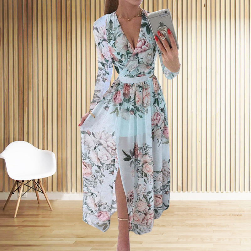 Damer blomst design maxikjole med dyb slids og elegant indpakningslook Stilla
