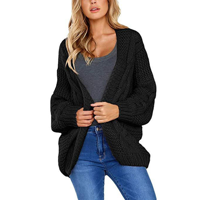 Kvinders chunky strikket cardigan med elegant kabelmønster og løs pasform Stilla