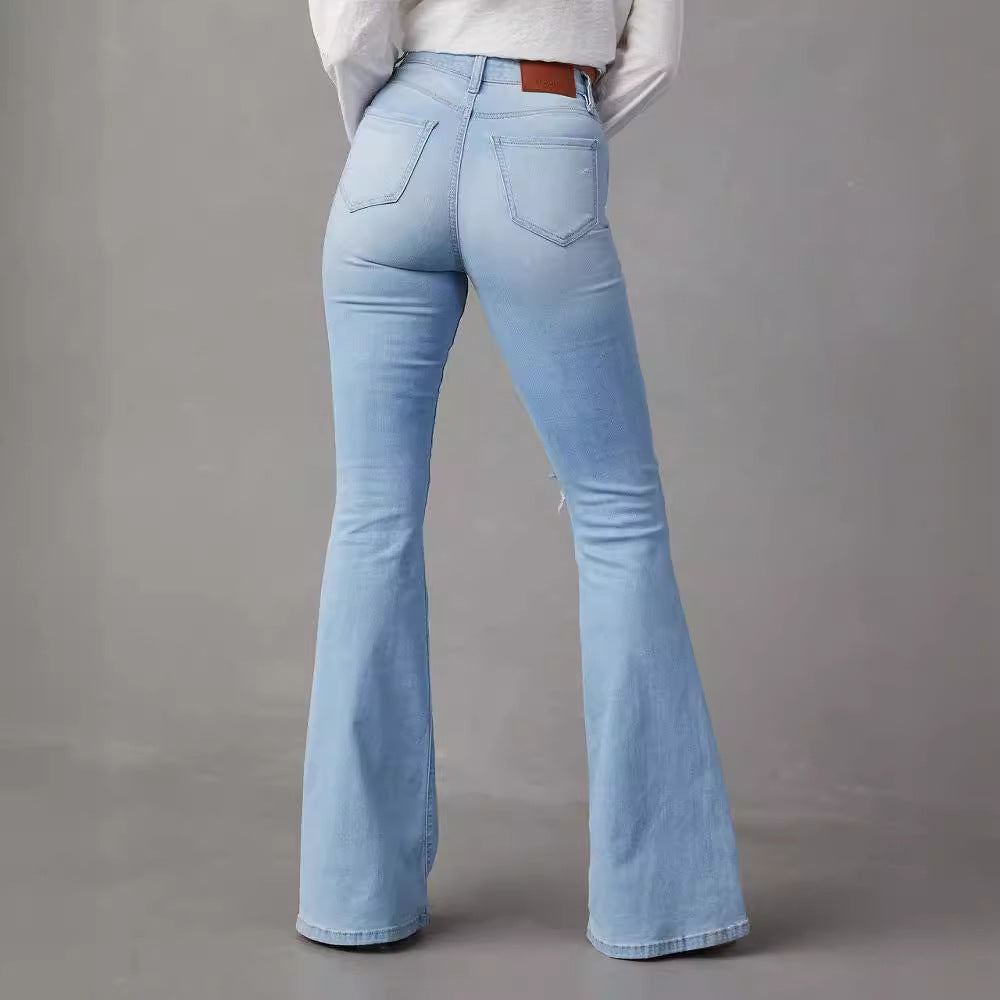 Kvinde bell jeans med trendy slidte detaljer og høj talje Skovae