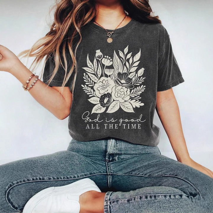 Dame T-shirt med floralt motiv og inspirerende tekst Stilla