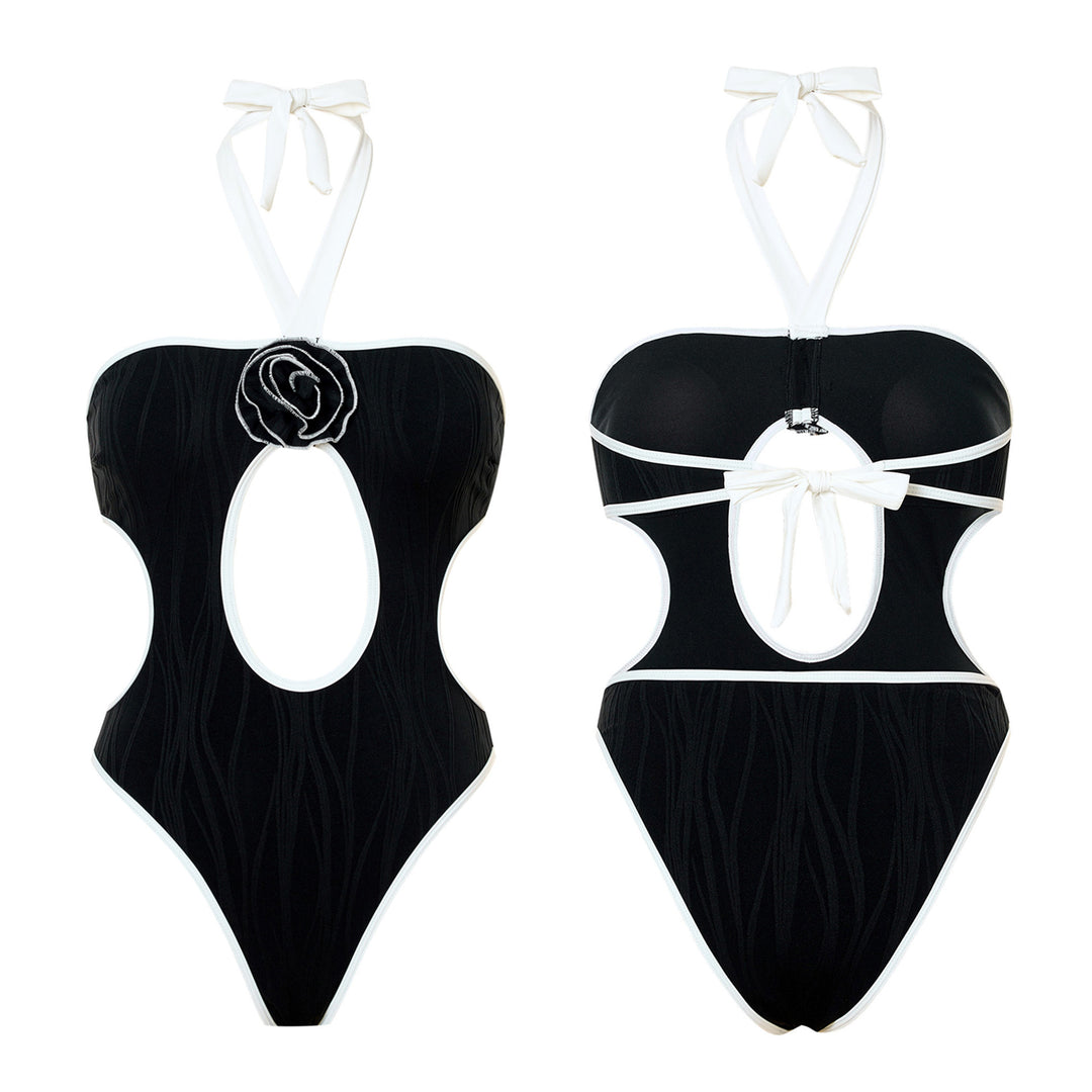 Dame Én-delt Badedragt med elegant Cut-Out-design og Blomsterapplikation Stilla