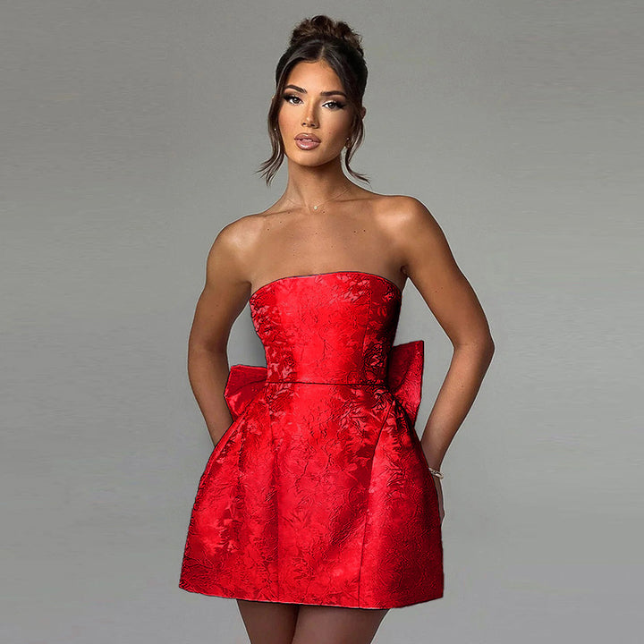 Dame off-shoulder cocktailkjole med elegant sløjfedetalje Skovae