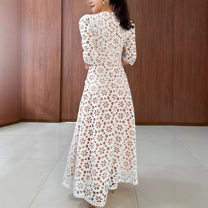 Dame spids-maxikjole med gennembrudt design og elegante puffærmer Stiila