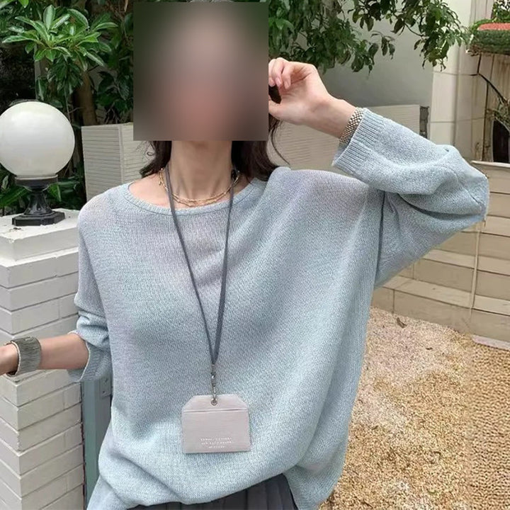 Dame afslappet strikpullover med bredt skåret ærme og tidløst design Stilla