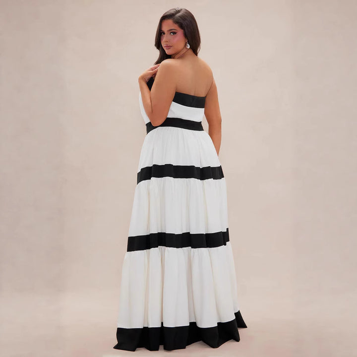 Dame maxikjole med off-shoulder design og vid skirt Skovae