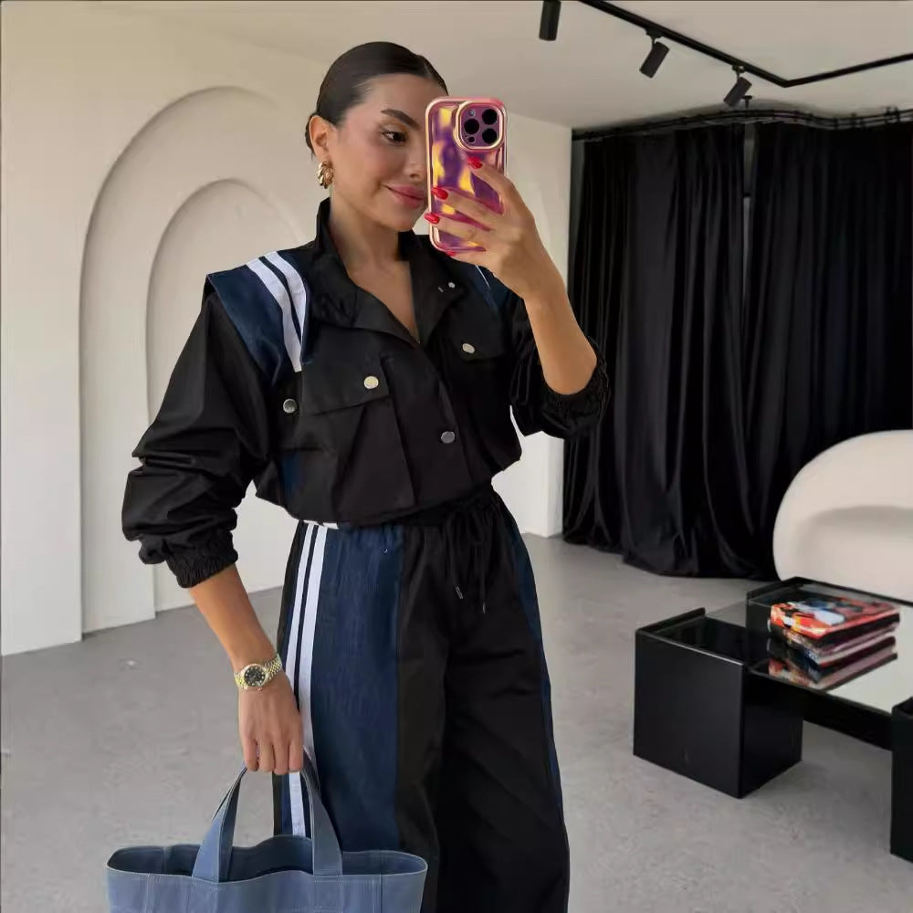 Dame sporty jumpsuit med sofistikeret snoreliv og kontraststriber Stilla